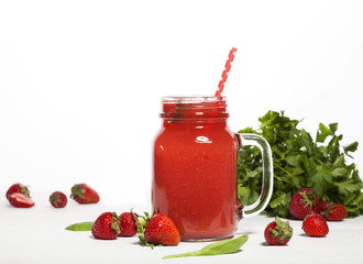 Strawberry smoothie or milkshake in a jar on white background.