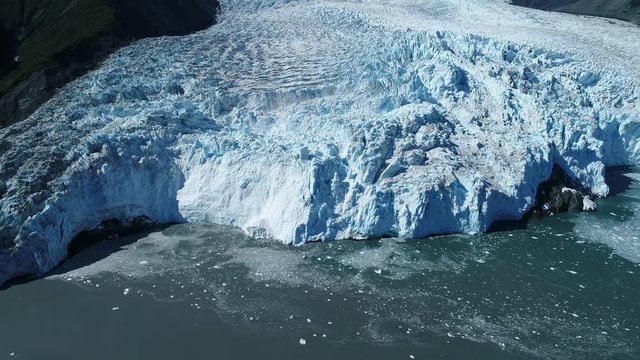 Arial 4k shots of a glacier and it's surroundings in Alaska