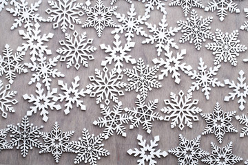 Fototapeta na wymiar Christmas, New Year wooden decoration snowflake.