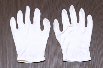 Obraz premium White cotton gloves