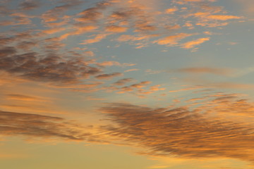 Fototapeta premium Beautiful clouds at sunrise, improbable sky