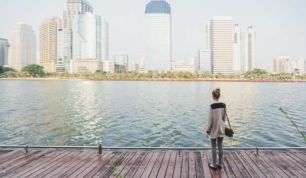 Woman Stading at the Dock