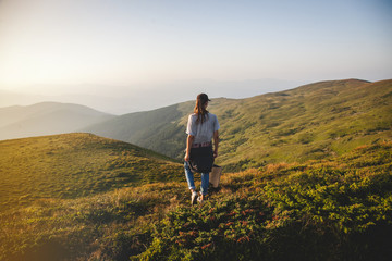 Fototapeta premium Girl Hiker in Beautiful Landscape
