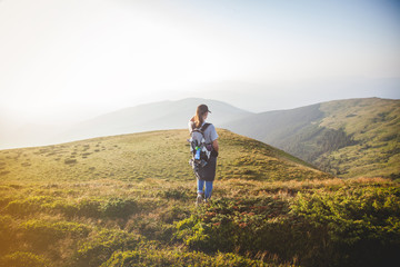 Obraz premium Hiker Walks into Carpathian Mountains
