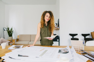 Female architect working in a beautiful studio.