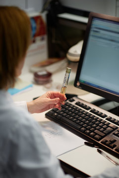 Female doctor working with computer in a hospital laboratory
