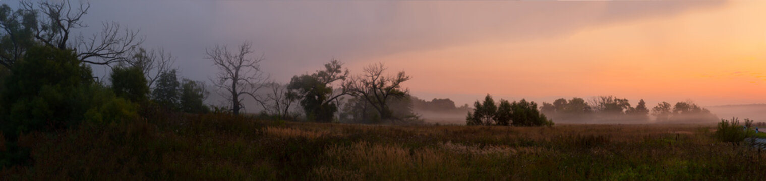 panorama of the misty sunrise of the gentle colors of the nature of the Russian forest-steppe © antonivano