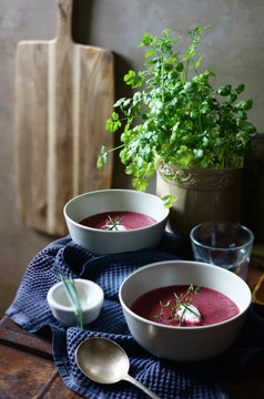 Beetroot soup: Homemade beetroot soup in white bowls.