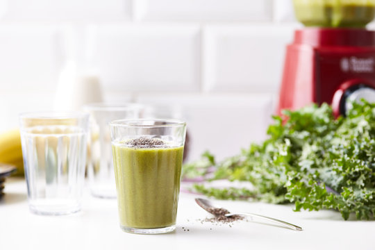 Bright smoothie made with kale and fruit