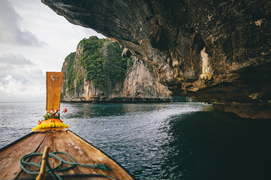 Boat in cave on water