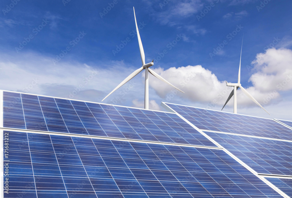 Poster solar panels and wind turbines generating electricity in power station green energy renewable with blue sky background 