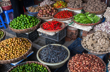 tropical spices and fruits sold at a local market in Hanoi (Vietnam)