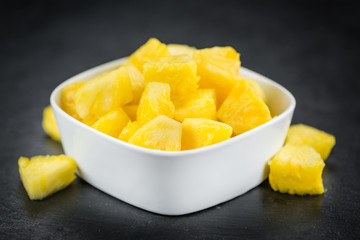 Sliced Pineapple on a slate slab, selective focus