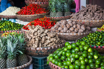 tropical spices and fruits sold at a local market in Hanoi (Vietnam)
