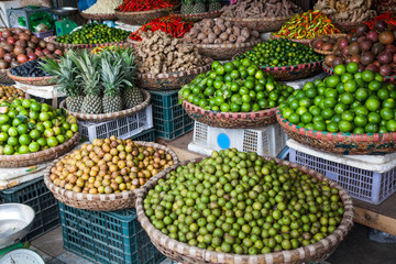tropical spices and fruits sold at a local market in Hanoi (Vietnam)