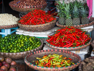 tropical spices and fruits sold at a local market in Hanoi (Vietnam)