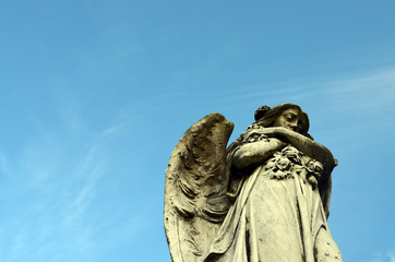 Religious statue in cemetery 