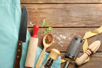Fototapeta na wymiar Kitchen utensils on wooden table. Cooking classes concept