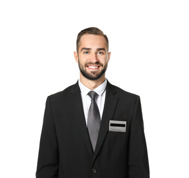 Male hotel receptionist in uniform on white background