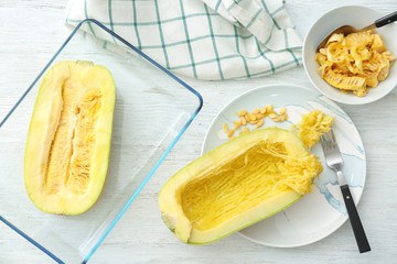 Halves of fresh spaghetti squash on table
