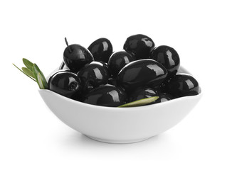 Bowl with ripe olives on white background