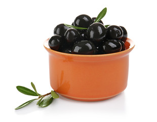 Bowl with ripe olives on white background