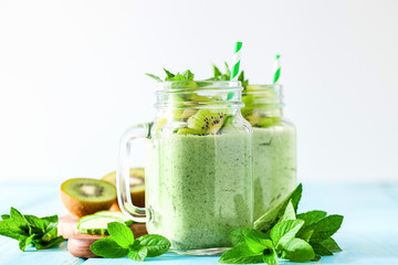 Green smoothie with kiwi fruit, cucumber, mint