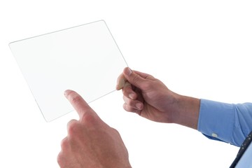 Cropped hand of businessman using glass interface