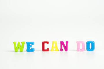 text WE CAN DO colorful word on white background