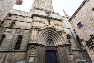 Fototapeta premium Side door of the Cathedral of Barcelona located in the gothic quarter of the city