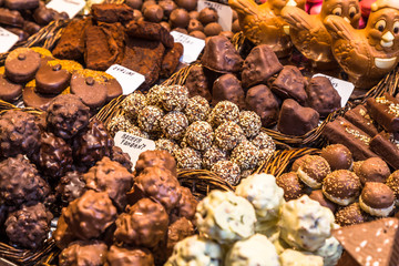 Variety of chocolates made from chocolate ready for sale in the market of La Boquería