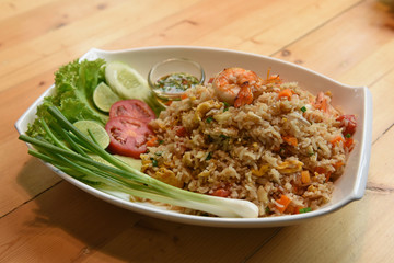 shrimp fried rice in white dish 