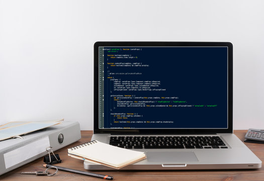 program code on computer screen. Programming and coding technology background.