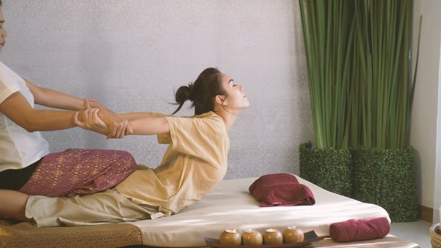 Beautiful Asian woman enjoying thai massage