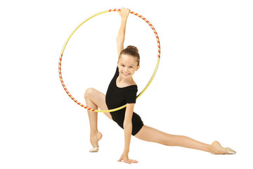 Young girl gymnast with hoop on white background