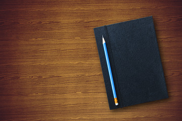pencil with notebook
