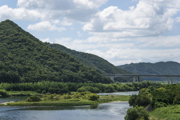 Sanyo motoring road, Yoshii river and the mountains. At Kumayama in Okayama, Japan.