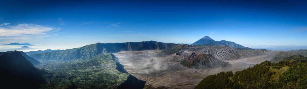 Mount Bromo volcano (Gunung Bromo) on blue sky background in Bromo Tengger Semeru National Park, East Java, Indonesia.