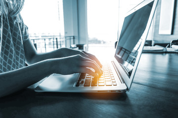 Woman office worker is typing keyboard, hacker or security network concept