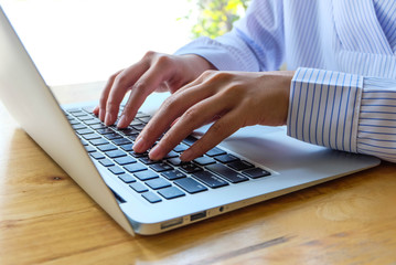 Woman office worker is typing keyboard, business technology and education concept