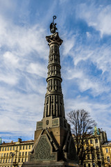 Fototapeta na wymiar Column of Glory in front of Holy Trinity Cathedral. Russo-Turkish War memorial column.