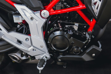 closeup small sport racing modern motobike or motorcycle engine