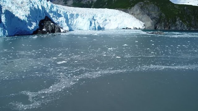 Arial 4k shots of a glacier and it's surroundings in Alaska