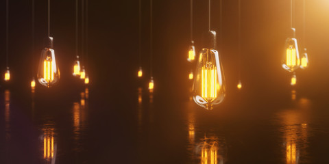 viele Edison Glühbirnen hängen im Raum und leuchten mit warmem Licht