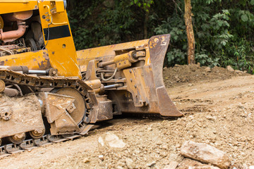 Excavator backhoe loader heavy equipment vehicle on duty building road