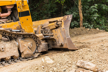 Fototapeta premium Excavator backhoe loader heavy equipment vehicle on duty building road