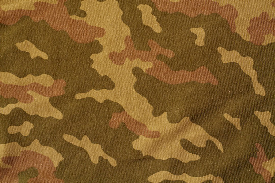 Textile camouflage uniform color background pattern.