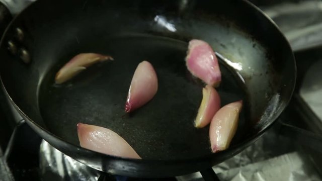 Shallots burned in a pan