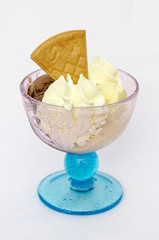 Ice Cream In The Cup with whip cream on White Background. Selective focus.