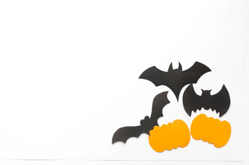 Halloween background, black bats and orange pumpkins on white background,hand made fall decor.